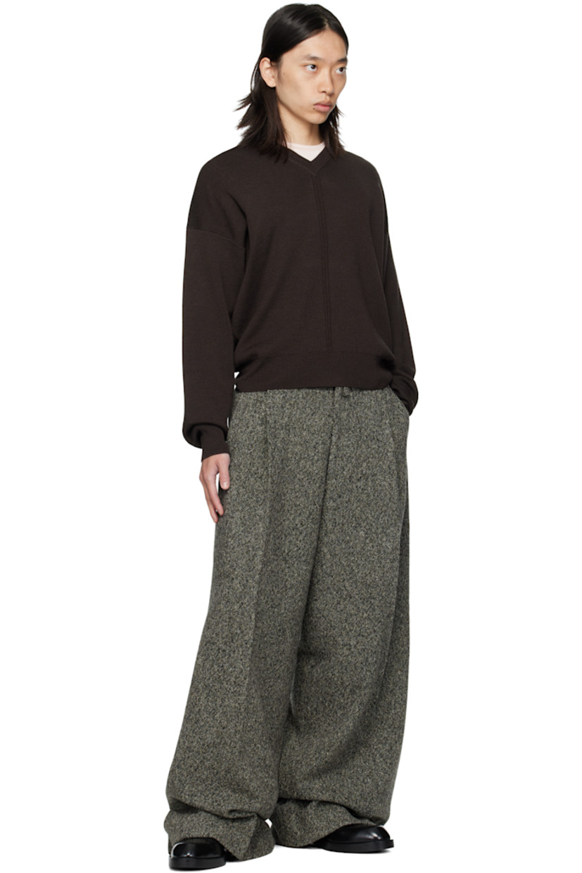 Brushed wool- and viscose-blend tweed trousers.

· Marling throughout
· Wide, straight-leg
· Belt loops
· Four-pocket styling
· Zip fly
· Pleats at front

Supplier color: Grey