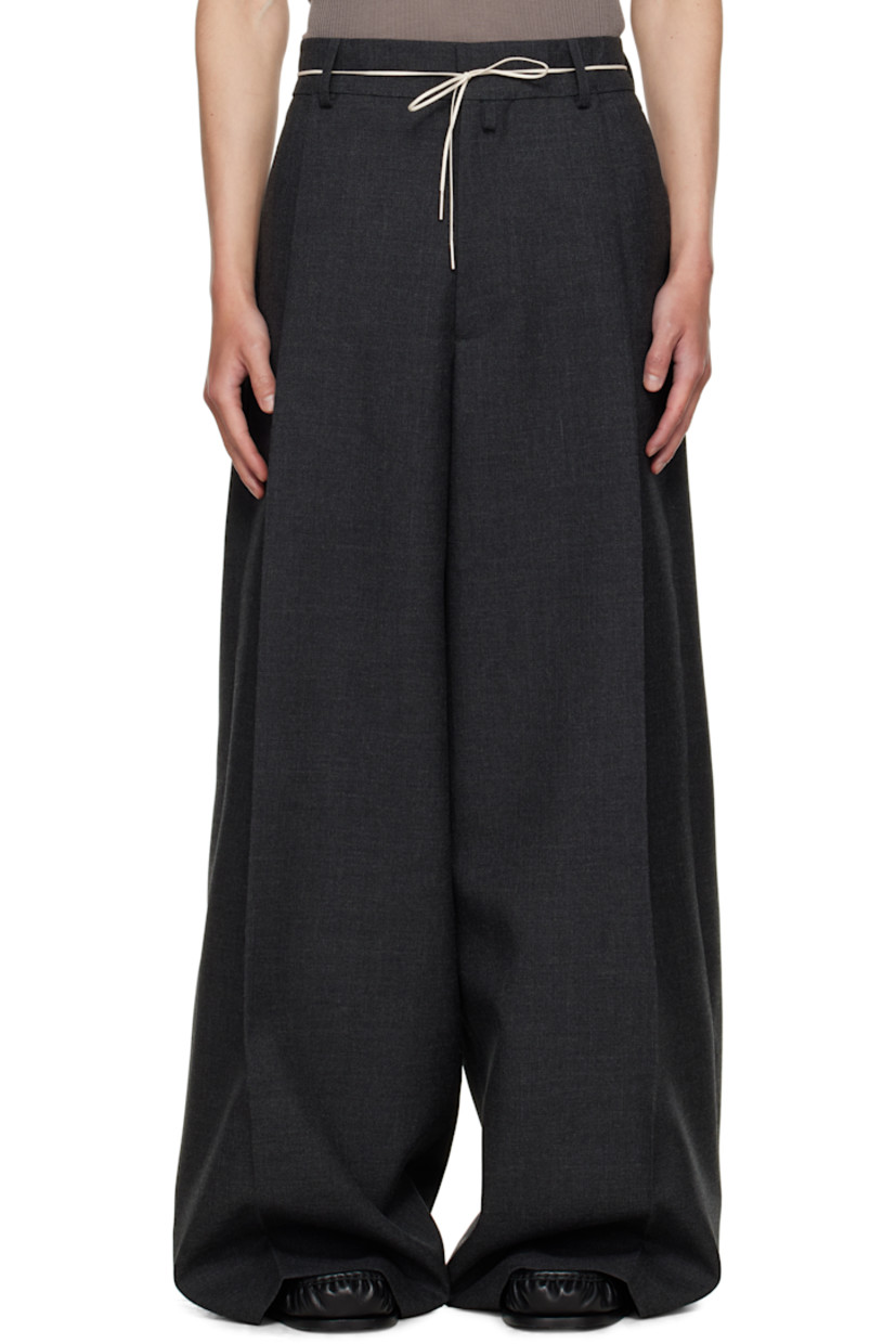 Wool canvas trousers.

· Wide-leg 
· High-rise
· Belt loops and detachable self-tie belt at waistband
· Four-pocket styling
· Zip fly
· Pleats at front
· Creased legs

Supplier color: Dark grey