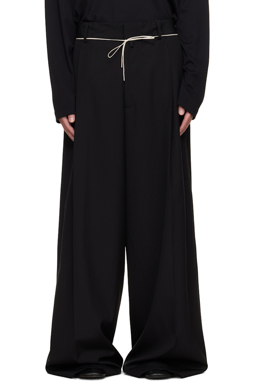 Wool canvas trousers.

· Wide-leg 
· High-rise
· Belt loops and detachable self-tie belt at waistband
· Four-pocket styling
· Zip fly
· Pleats at front
· Creased legs

Supplier color: Black