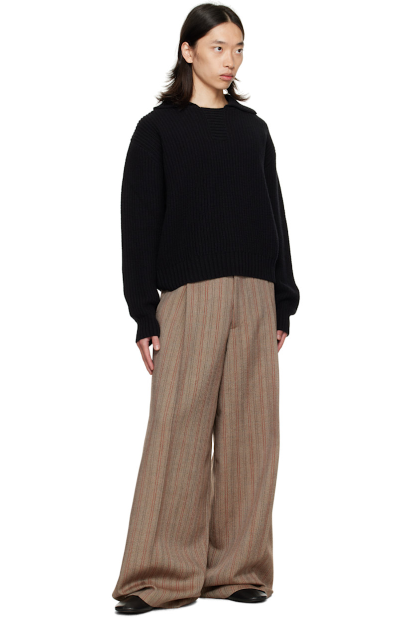 Wool canvas trousers.

· Stripes throughout
· Wide-leg 
· High-rise
· Belt loops
· Four-pocket styling
· Zip fly
· Pleats at front
· Creased legs

Supplier color: Rust