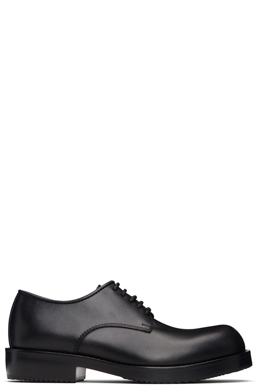 Buffed leather derbys.

· Lace-up closure
· Topstitching at welt
· Stacked leather heel with rubber injection
· Leather sole with rubber injection

Supplier color: Black
