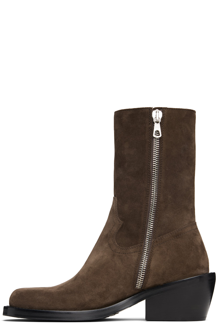 Mid-calf suede boots.

· Square toe
· Zip closure at inner side
· Topstitching at welt
· Stacked leather heel with rubber injection
· Leather sole with Vibram® rubber injection
· Heel: H2.5"

Supplier color: Dark brown