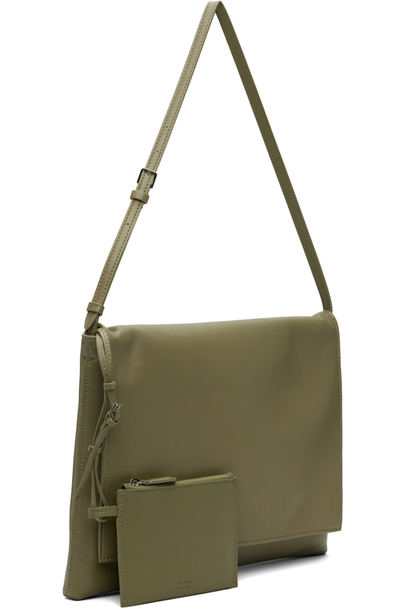 Buffed lambskin shoulder bag.

· Adjustable shoulder strap
· Logo embossed at back face
· Flap closure
· Detachable zip pouch at interior
· Buffed leather lining
· H10" x W12" x D1"

Supplier color: Sage