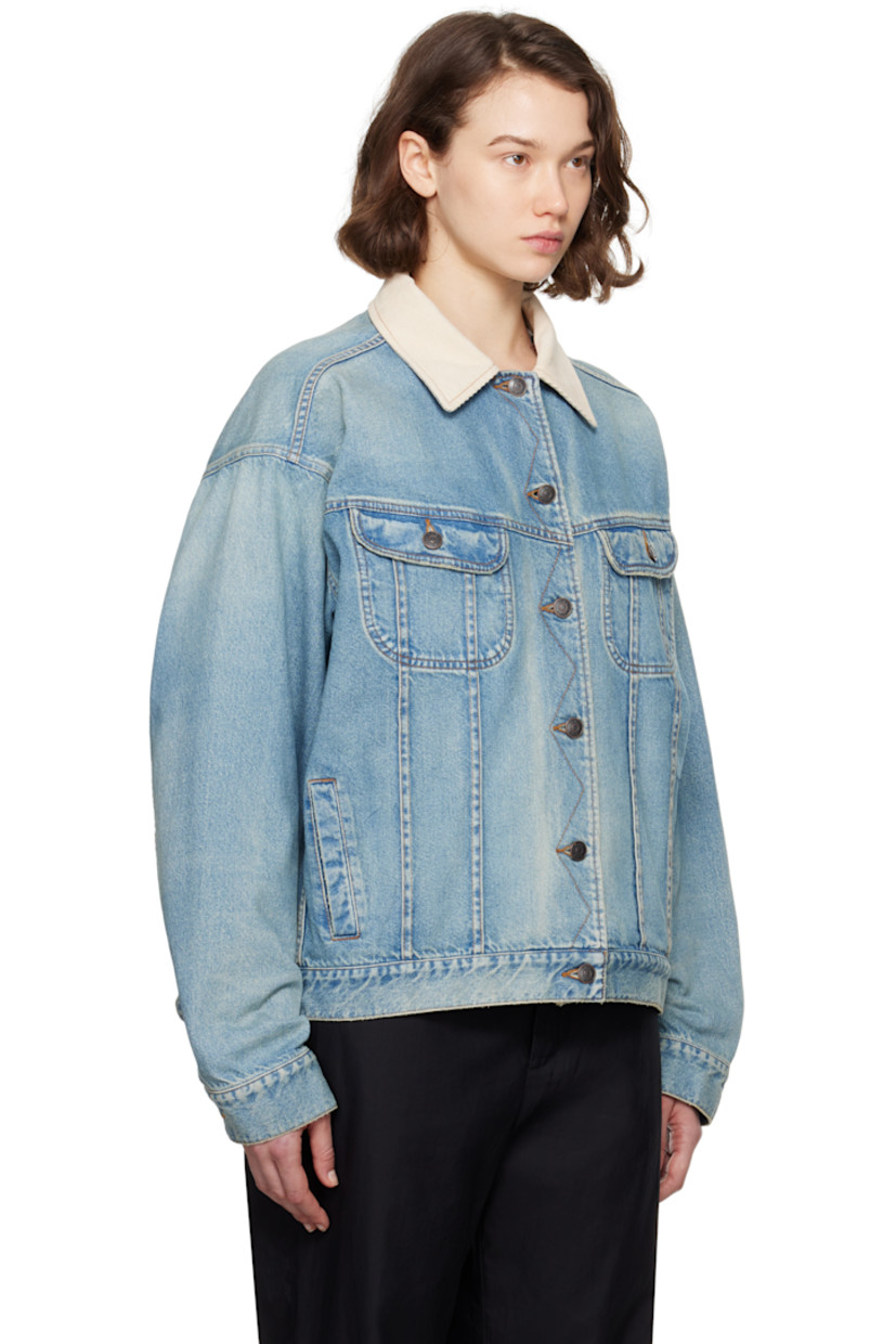 Non-stretch denim jacket. Fading throughout. 

· Corduroy spread collar
· Button closure
· Flap and welt pockets
· Pleats at front
· Buttoned barrel cuffs
· Adjustable button tabs at back hem
· Full flannel lining
· Logo-engraved antiqued copper-tone hardware
· Contrast stitching in tan

Supplier color: Light indigo