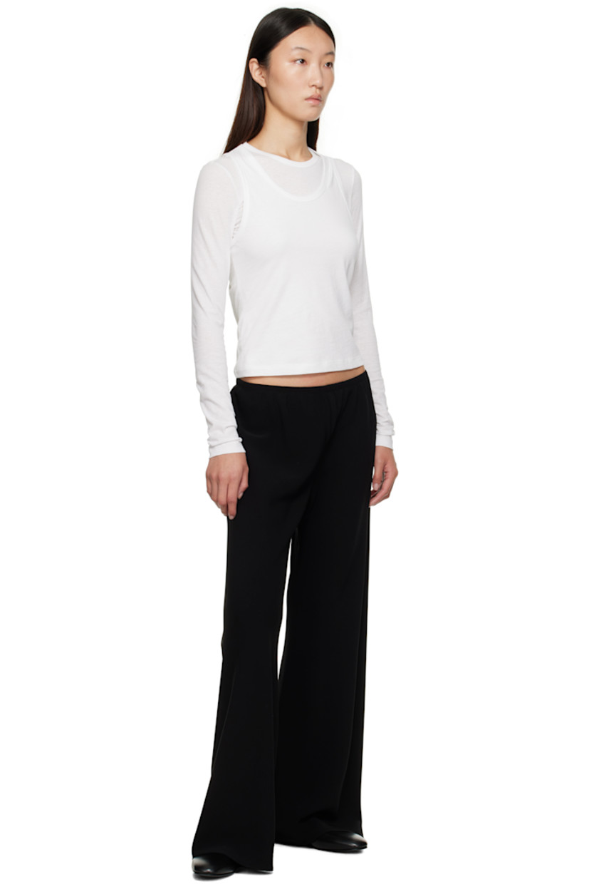 Double-faced cady trousers.

· Bias-cut 
· Wide-leg
· Elasticized waistband

Supplier color: Black