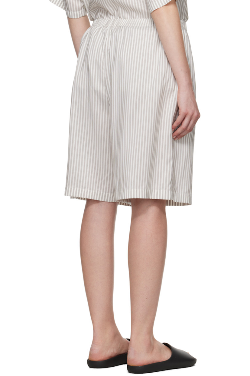 Plain-woven silk shorts. Stripes throughout.

· Elasticized waistband
· Two-pocket styling

Supplier color: White/Grey