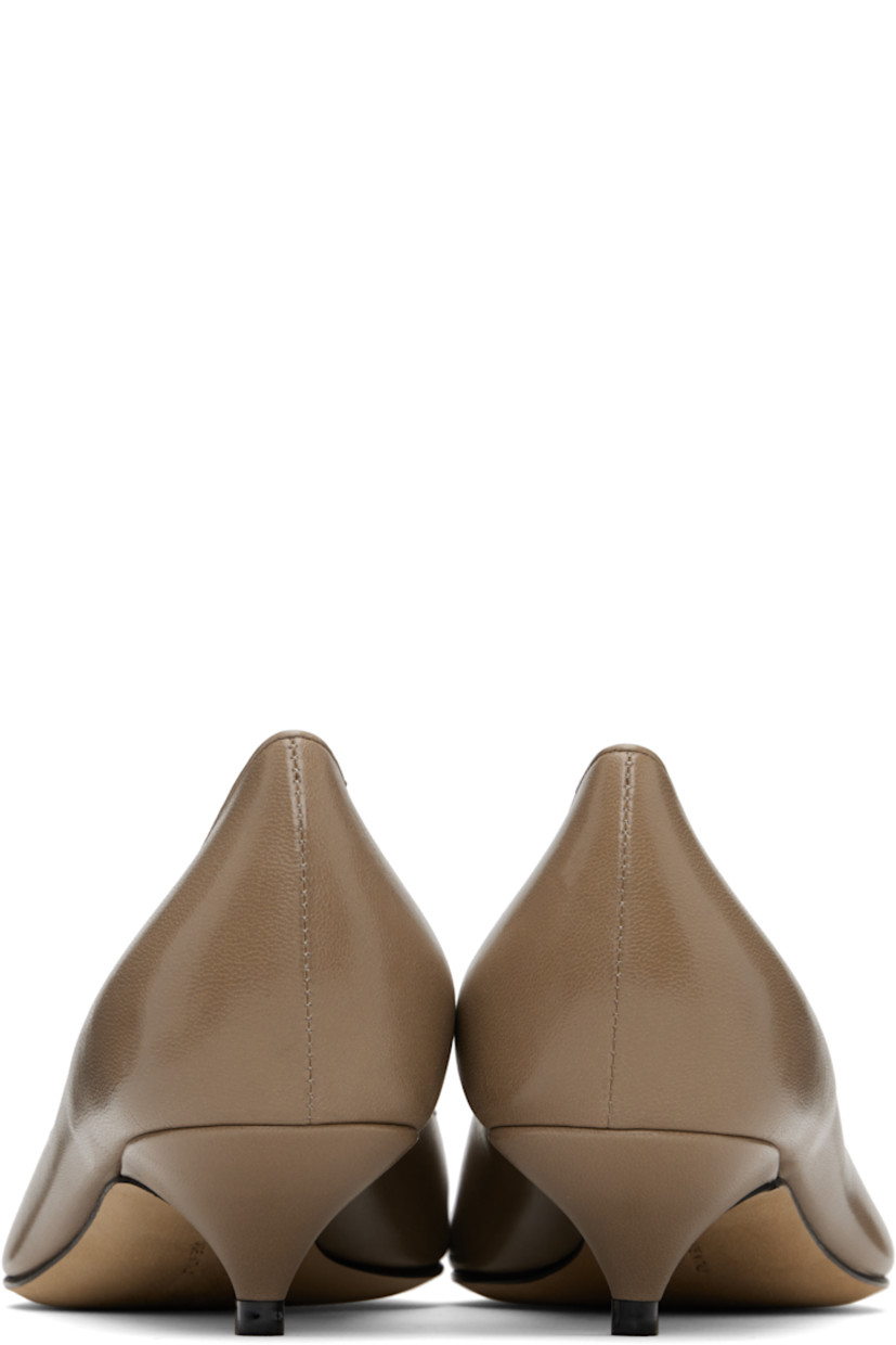 Grained lambskin heels. 

· Pointed toe
· Suede and grained leather lining
· Covered kitten heel with rubber injection
· Nubuck sole with rubber injection 
· Heel: H1.5"

Supplier color: Beige grey