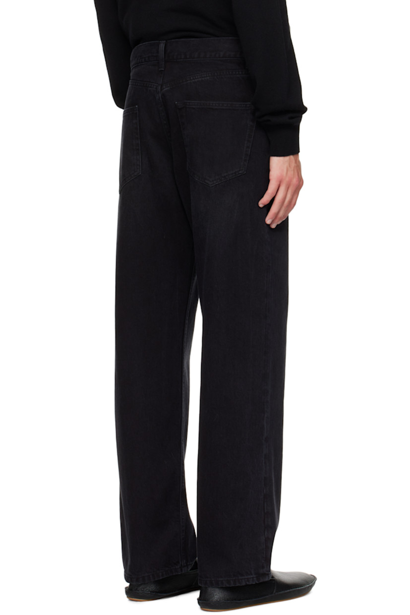 Non-stretch denim jeans.

· Fading throughout 
· Loose-fit 
· Belt loops
· Five-pocket styling
· Button fly 

Supplier color: Black
