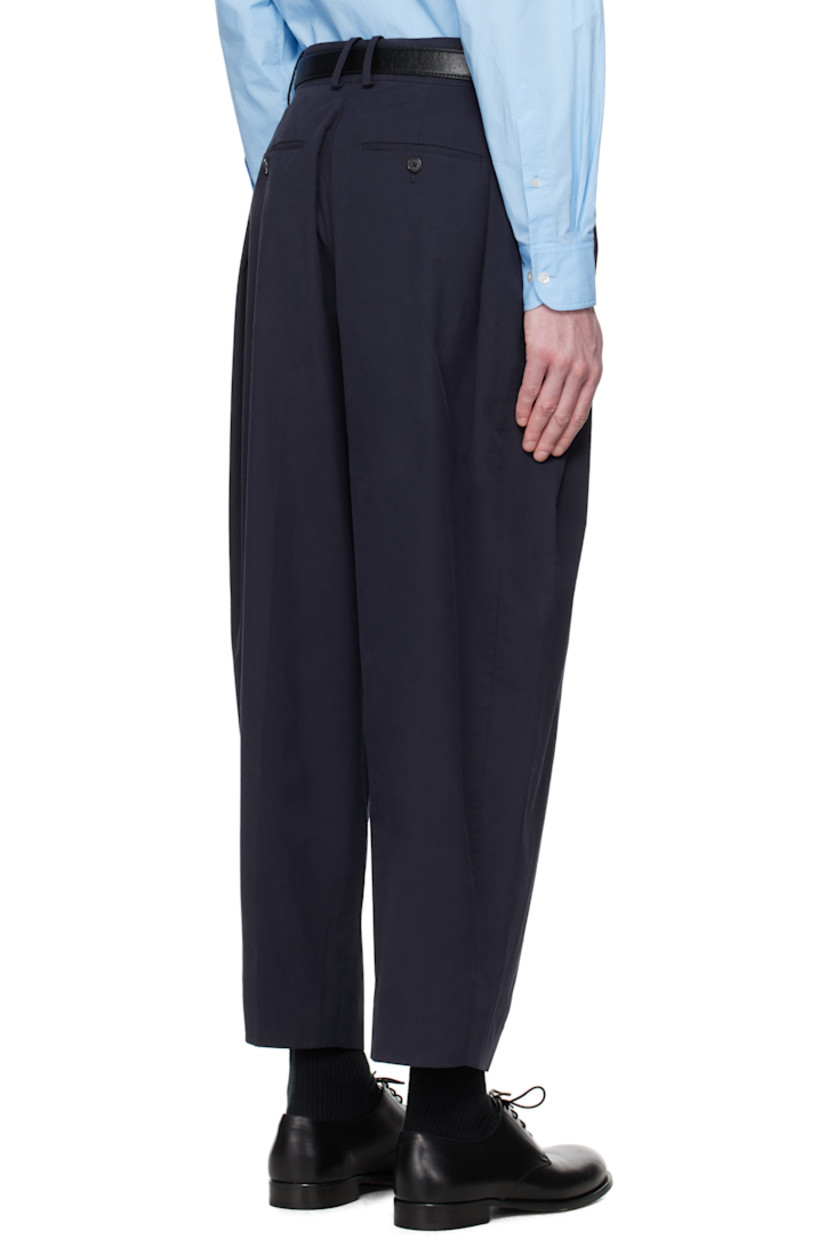 Cotton twill trousers.

· Belt loops
· Four-pocket styling
· Zip fly
· Pleats at front and back

Supplier color: Dark navy