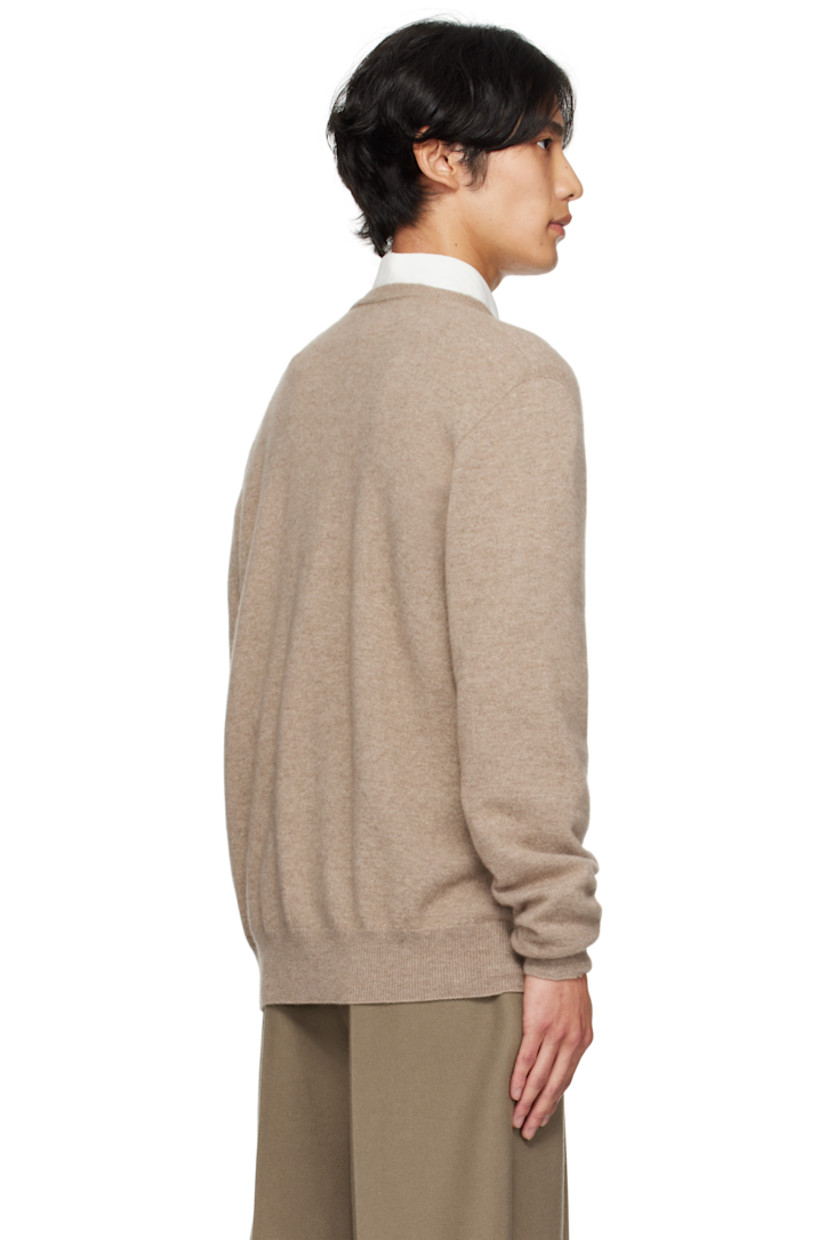 Knit cashmere sweater.

· 15-gauge
· Rib-knit V-neck, hem, and cuffs

Supplier color: Taupe