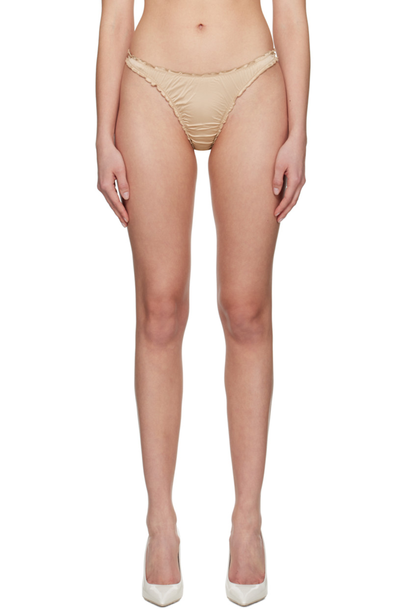 Stretch nylon satin thong. Ruffled edges and ruching throughout.

· Elasticized waistband
· Partial jersey lining

Supplier color: Golden beige