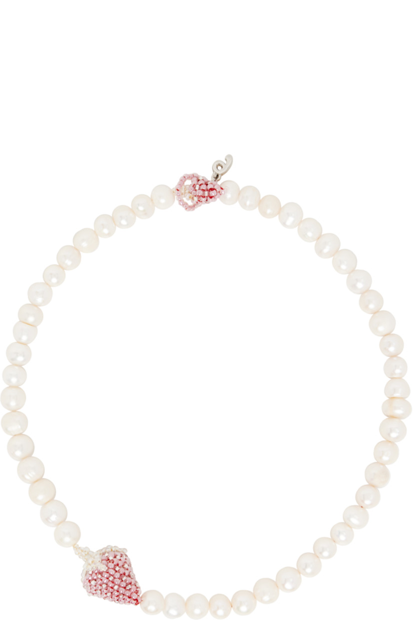 Handcrafted beaded freshwater pearl necklace in white.

· Beaded glass graphic at drop and fastening
· Logo charm at toggle fastening
· L16.5"

Supplier color: Pink