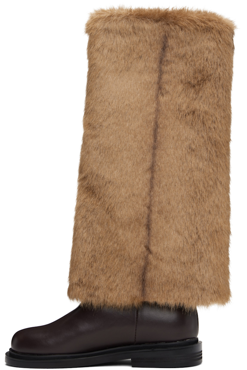 Knee-high buffed leather and faux-fur boots. 

· Pigskin lining 
· Stacked leather and rubber midsole 
· Treaded rubber sole 

Supplier color: Stripe brown