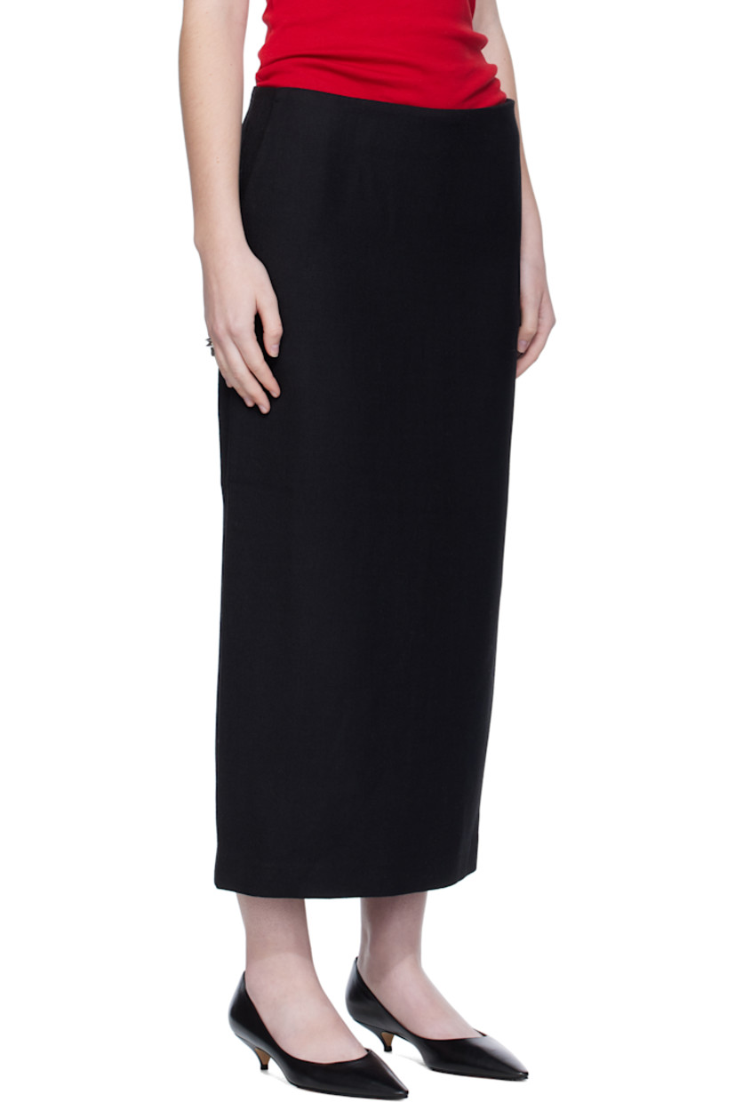 Wool-blend twill maxi skirt.

· Two-pocket styling
· Zip closure at side
· Darts at back waist
· Central vent at back hem

Supplier color: Black