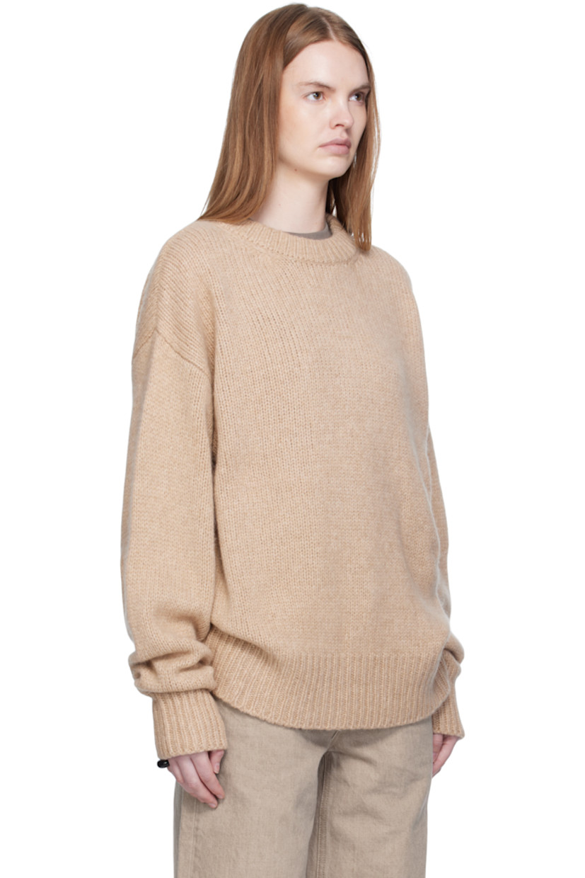Knit cashmere- and baby yak-blend sweater.

· Rib-knit crewneck, hem, and cuffs
· Dropped shoulders

Supplier color: Beige