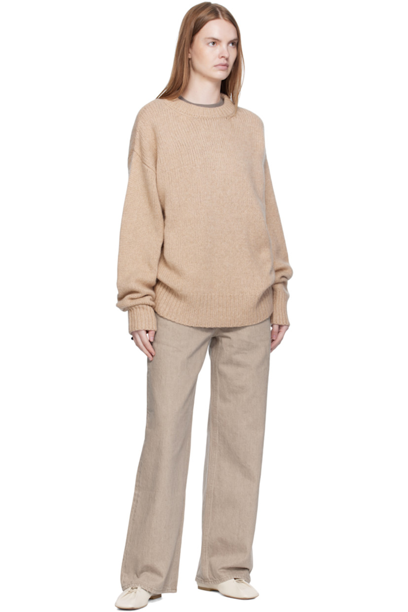 Knit cashmere- and baby yak-blend sweater.

· Rib-knit crewneck, hem, and cuffs
· Dropped shoulders

Supplier color: Beige