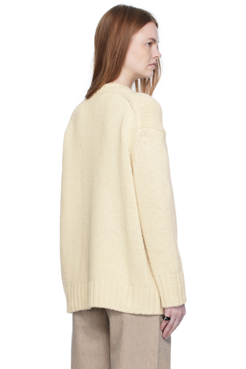 Knit wool- and cashmere-blend sweater.

· Rib-knit crewneck, hem, and cuffs
· Dropped shoulders

Supplier color: Ivory