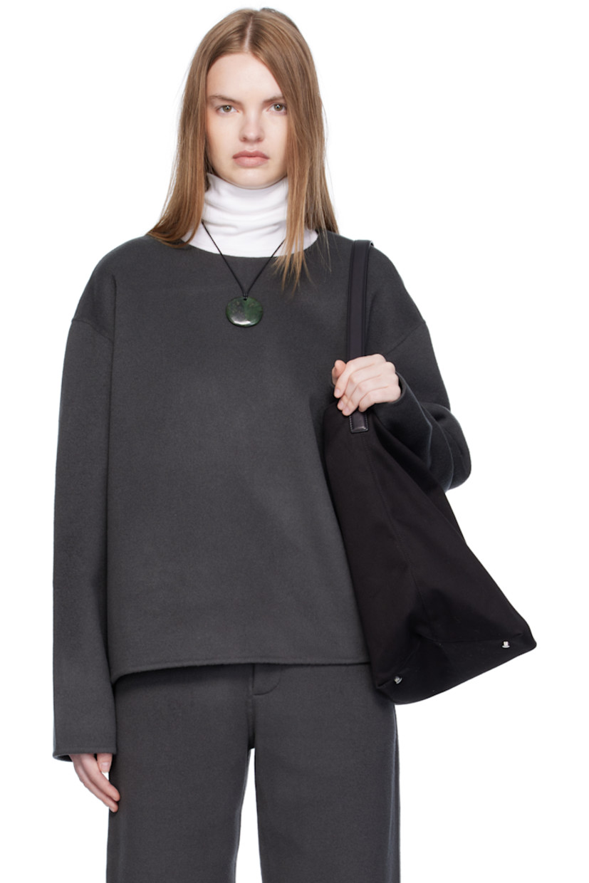 Handcrafted felted wool- and cashmere-blend top.

· Round neck
· Dropped shoulders
· Notch at back collar

Supplier color: Grey