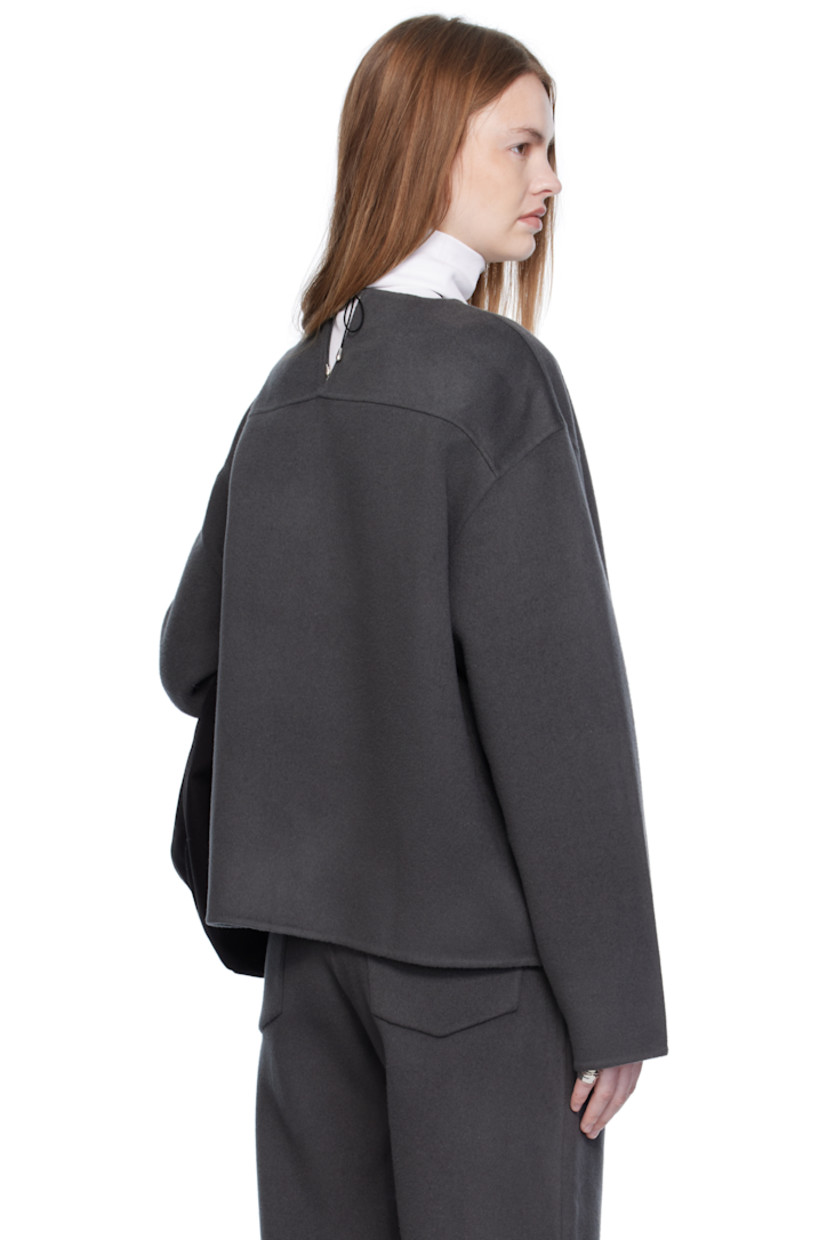 Handcrafted felted wool- and cashmere-blend top.

· Round neck
· Dropped shoulders
· Notch at back collar

Supplier color: Grey