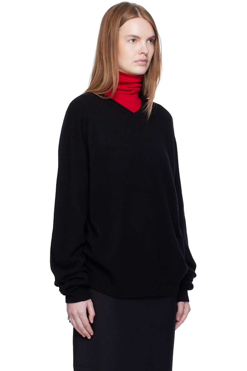 Knit cashmere sweater.

· Rib-knit V-neck, hem, and cuffs
· Dropped shoulders

Supplier color: Black