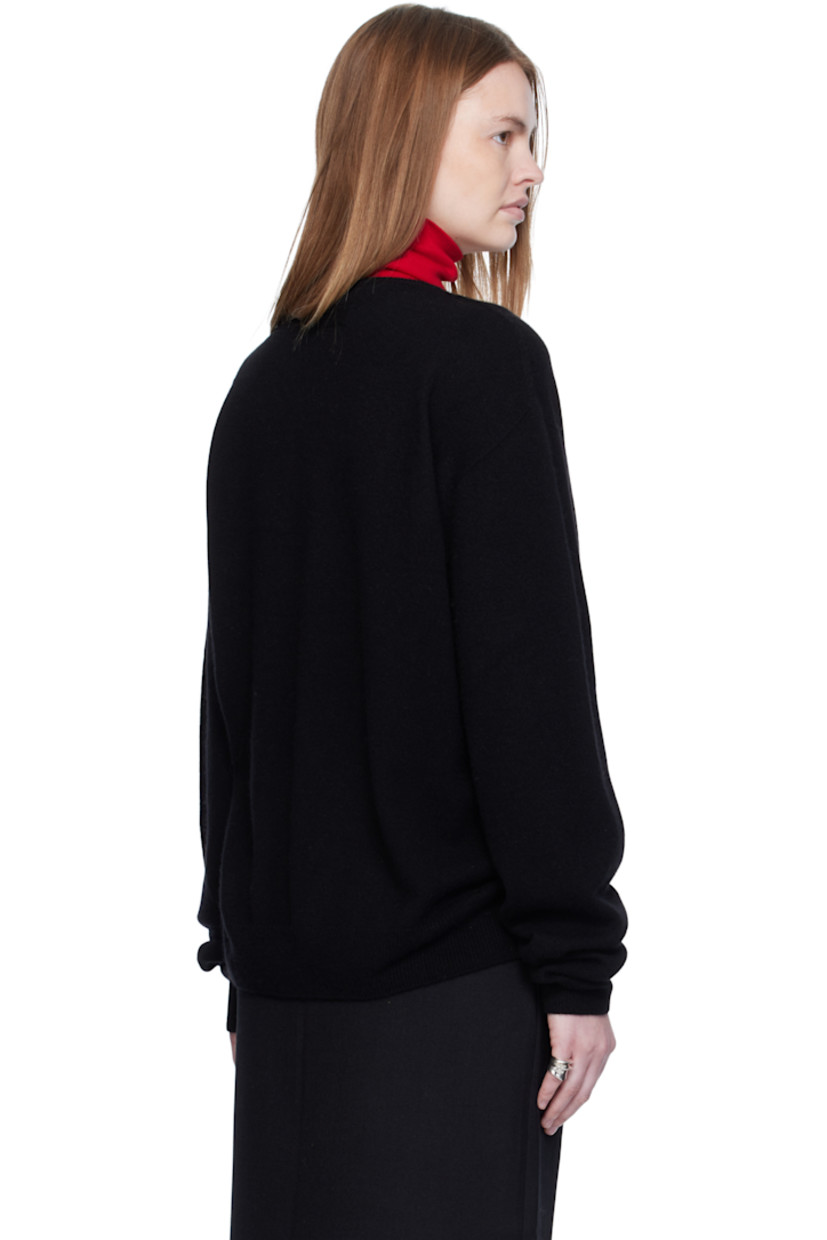 Knit cashmere sweater.

· Rib-knit V-neck, hem, and cuffs
· Dropped shoulders

Supplier color: Black