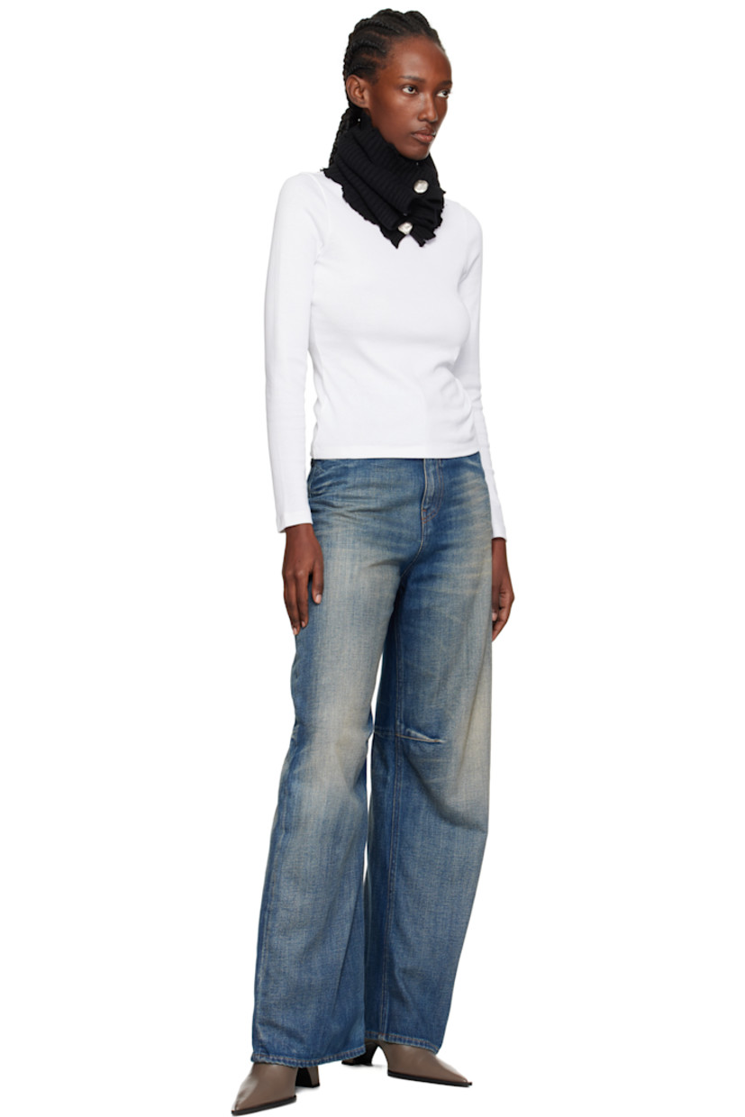Rectangular rib-knit wool-blend tube scarf.

· Laddering and raw edges throughout
· Button closure 
· Logo patch at back face
· Mismatched oxidized hardware

Supplier color: Black