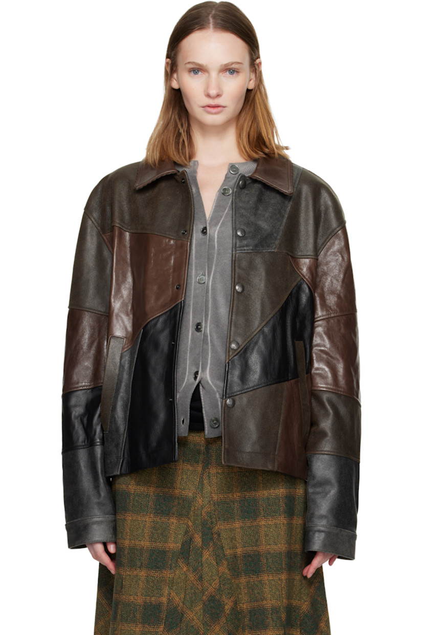 Paneled grained leather jacket.

· Fading and crackled pattern throughout
· Spread collar with whipstitched edges
· Press-stud closure
· Welt pockets at waist
· Adjustable press-stud cuffs
· Patch pockets at interior
· Full satin lining

Supplier color: Black/Brown