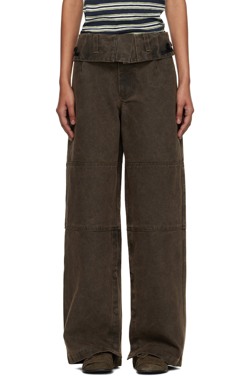 Cotton canvas trousers.

· Belt loops at foldover waistband
· Four-pocket styling
· Zip fly
· Press-stud vent at cuffs
· Button hardware at waistband outseams

Supplier color: Brown