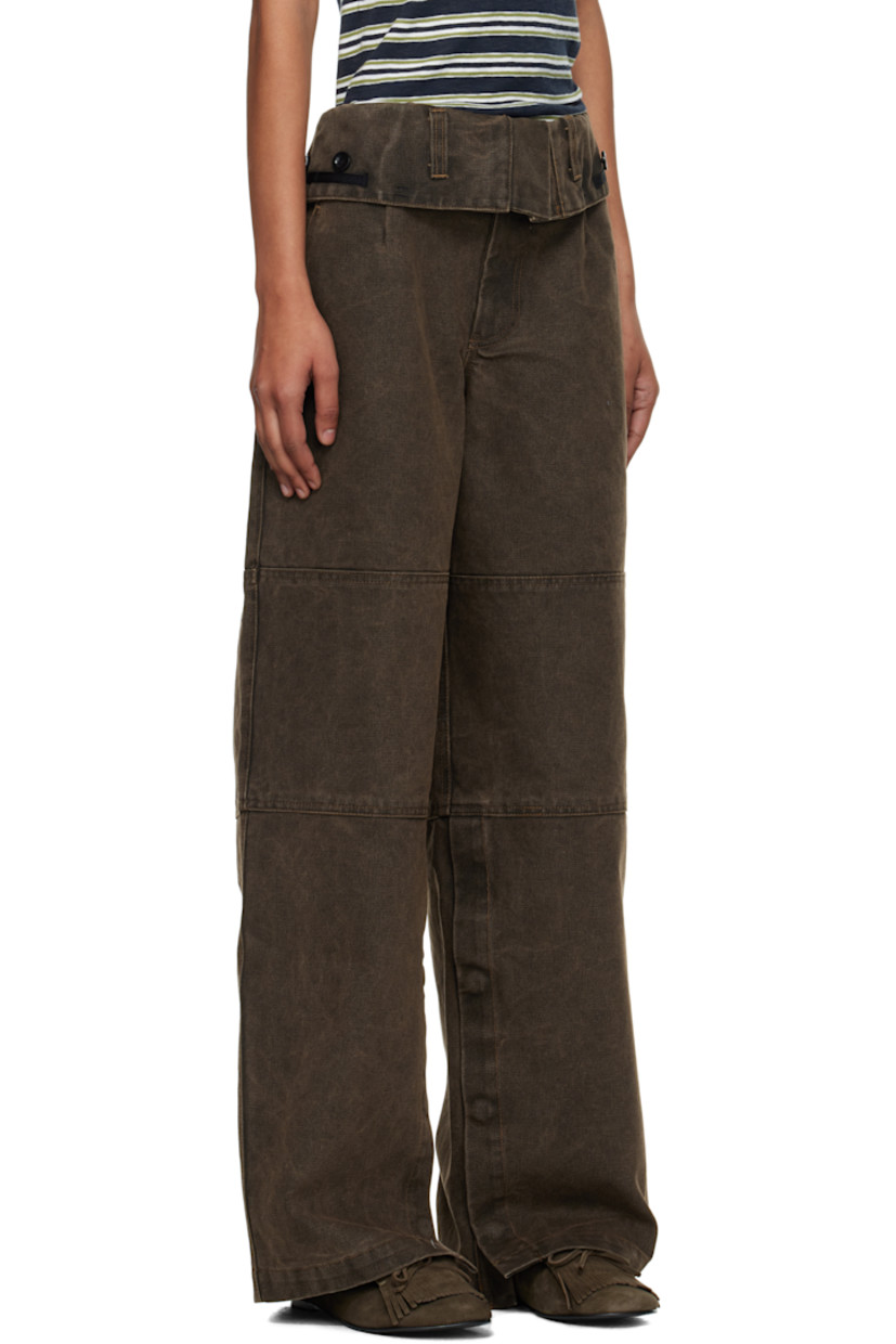 Cotton canvas trousers.

· Belt loops at foldover waistband
· Four-pocket styling
· Zip fly
· Press-stud vent at cuffs
· Button hardware at waistband outseams

Supplier color: Brown
