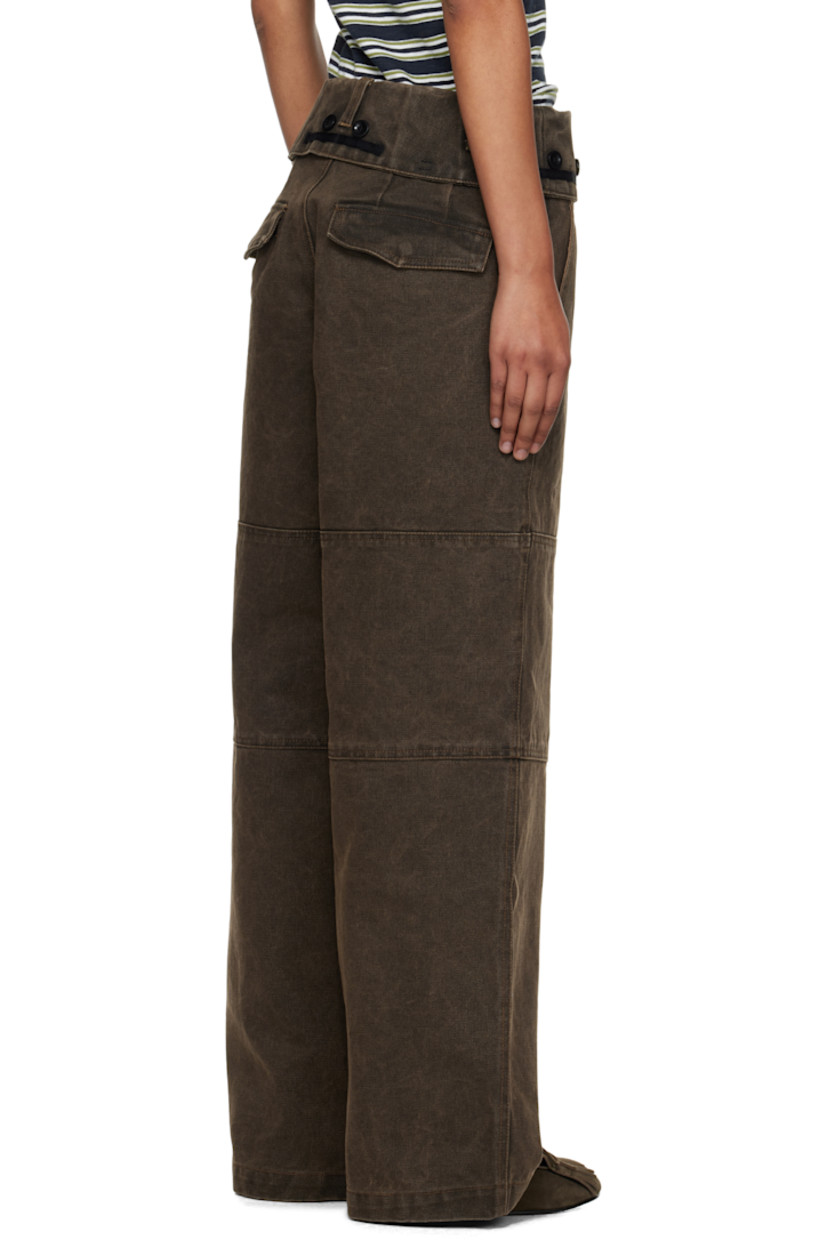 Cotton canvas trousers.

· Belt loops at foldover waistband
· Four-pocket styling
· Zip fly
· Press-stud vent at cuffs
· Button hardware at waistband outseams

Supplier color: Brown
