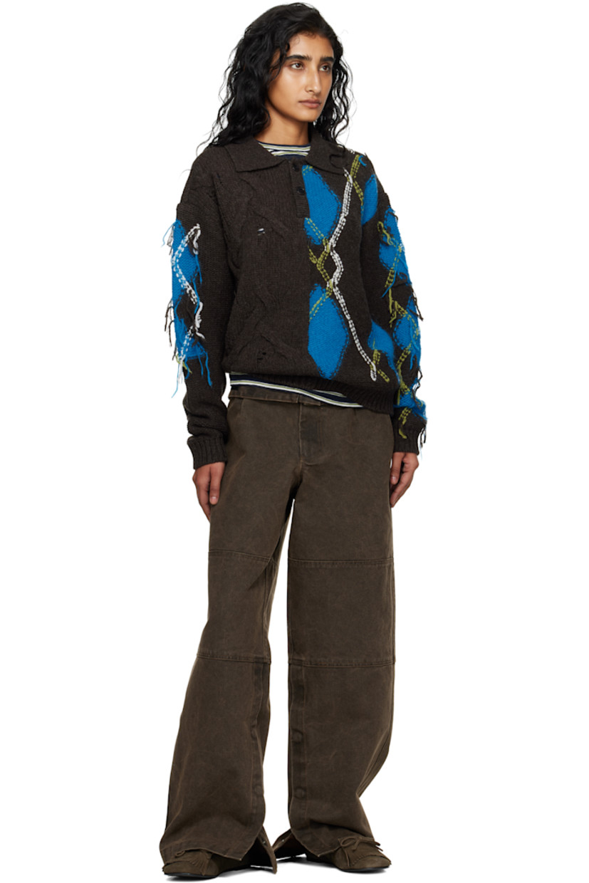 Cotton canvas trousers.

· Belt loops at foldover waistband
· Four-pocket styling
· Zip fly
· Press-stud vent at cuffs
· Button hardware at waistband outseams

Supplier color: Brown