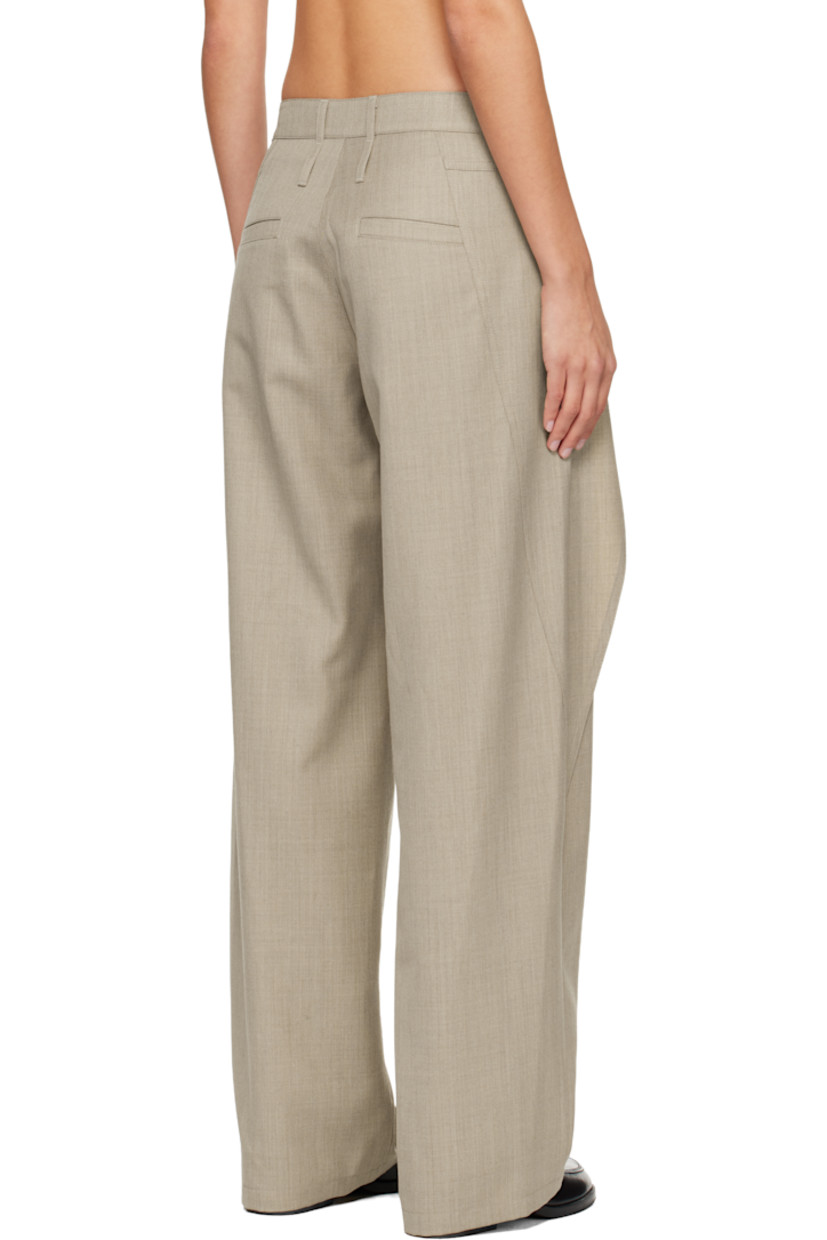 Wool-blend twill trousers.

· Overlay with button fastening at front
· Belt loops
· Four-pocket styling
· Zip fly

Supplier color: Beige