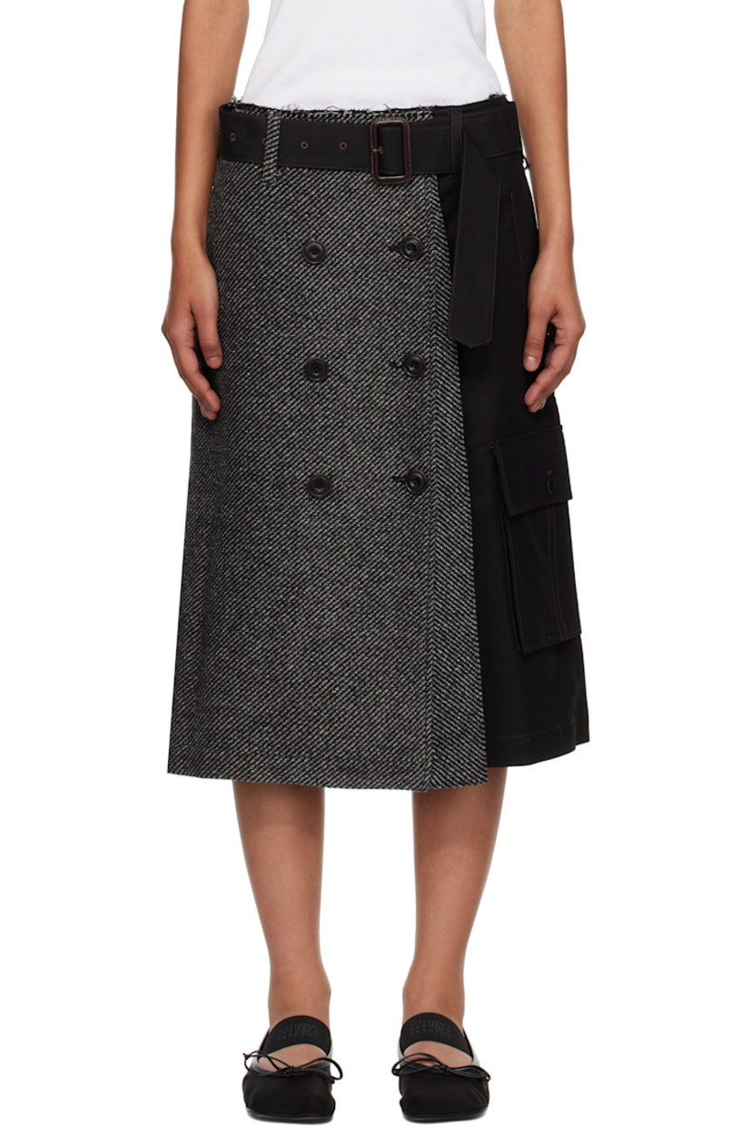Cotton twill and wool-blend flannel midi skirt. 

· Paneled and wrap construction 
· Stripes throughout 
· Belt loops, D-ring, and raw edge at waistband
· Detachable pin-buckle belt 
· Button hardware at front 
· Single-pocket styling
· Cargo pocket at side seam
· Contrast stitching in pink 

Supplier color: Black