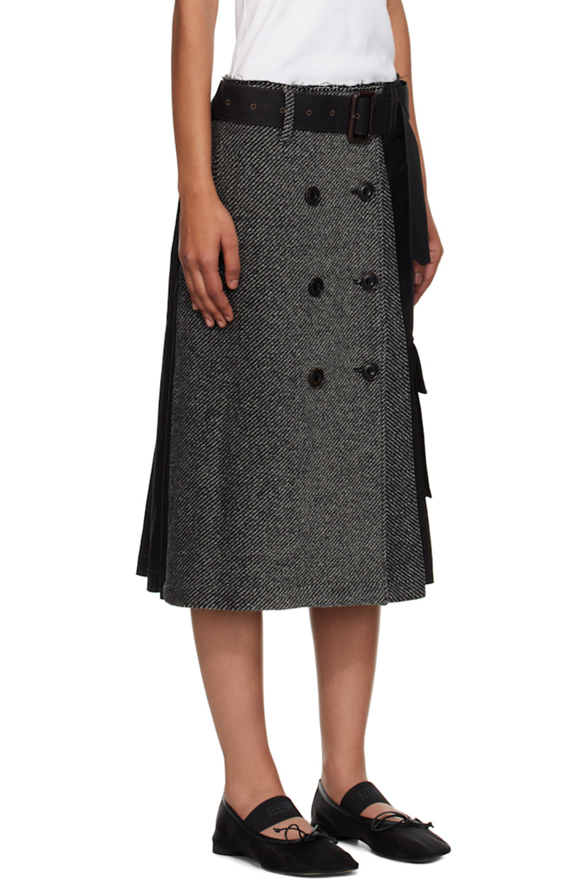 Cotton twill and wool-blend flannel midi skirt. 

· Paneled and wrap construction 
· Stripes throughout 
· Belt loops, D-ring, and raw edge at waistband
· Detachable pin-buckle belt 
· Button hardware at front 
· Single-pocket styling
· Cargo pocket at side seam
· Contrast stitching in pink 

Supplier color: Black