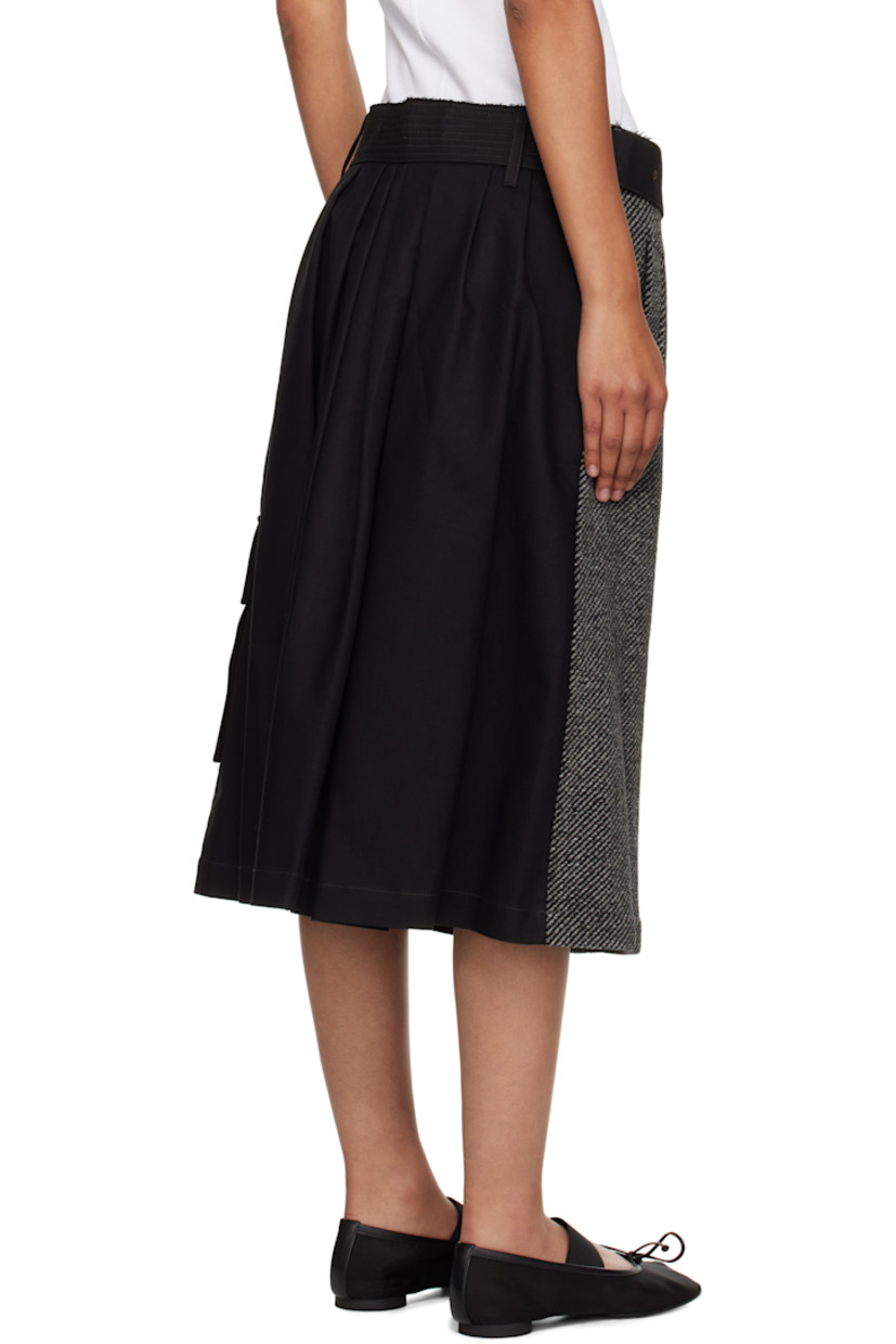 Cotton twill and wool-blend flannel midi skirt. 

· Paneled and wrap construction 
· Stripes throughout 
· Belt loops, D-ring, and raw edge at waistband
· Detachable pin-buckle belt 
· Button hardware at front 
· Single-pocket styling
· Cargo pocket at side seam
· Contrast stitching in pink 

Supplier color: Black