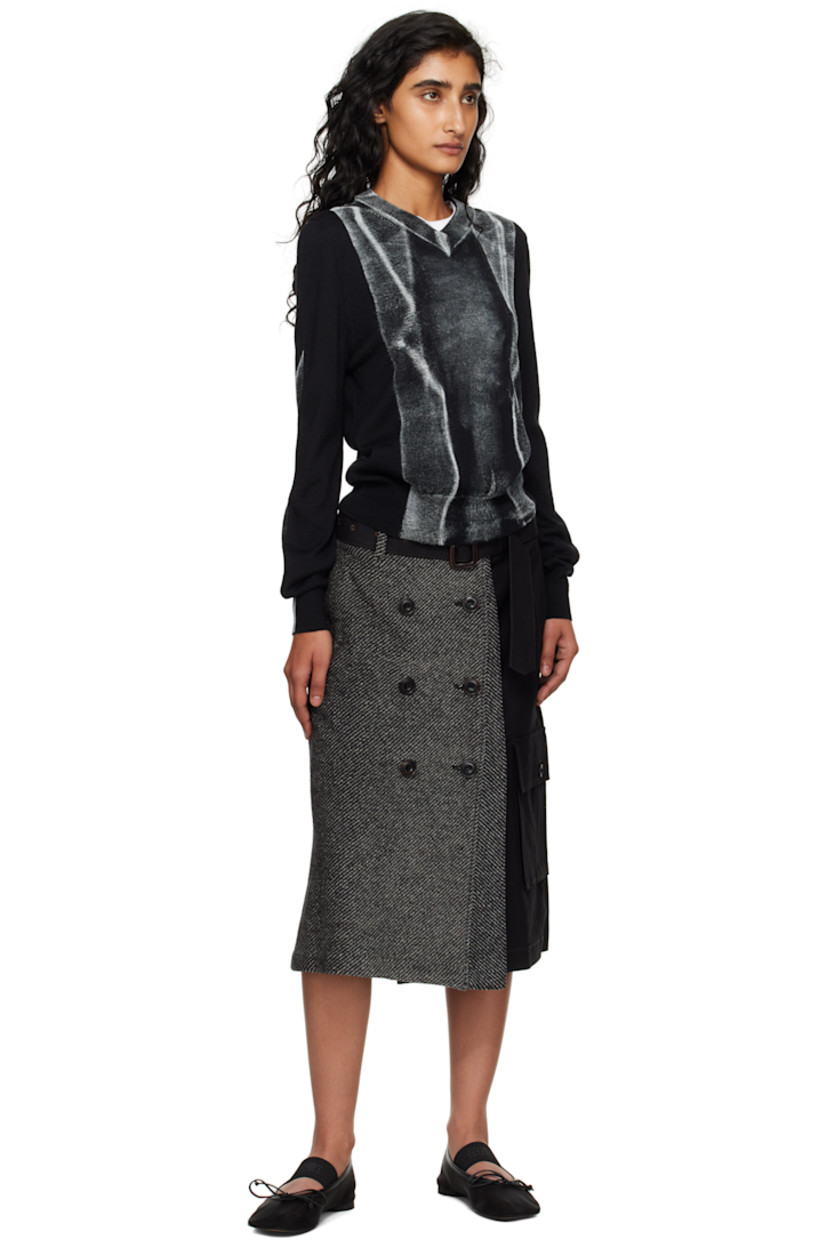 Cotton twill and wool-blend flannel midi skirt. 

· Paneled and wrap construction 
· Stripes throughout 
· Belt loops, D-ring, and raw edge at waistband
· Detachable pin-buckle belt 
· Button hardware at front 
· Single-pocket styling
· Cargo pocket at side seam
· Contrast stitching in pink 

Supplier color: Black