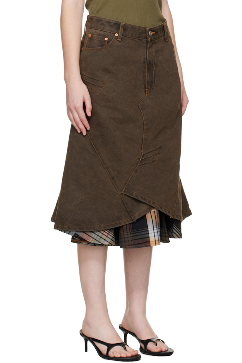 Non-stretch denim midi skirt.

· Fading throughout
· Paneled construction
· Darts throughout
· Belt loops at waist
· Five-pocket styling
· Zip fly
· Layered hem
· Leather logo patch at back waist

Supplier color: Sunset Brown