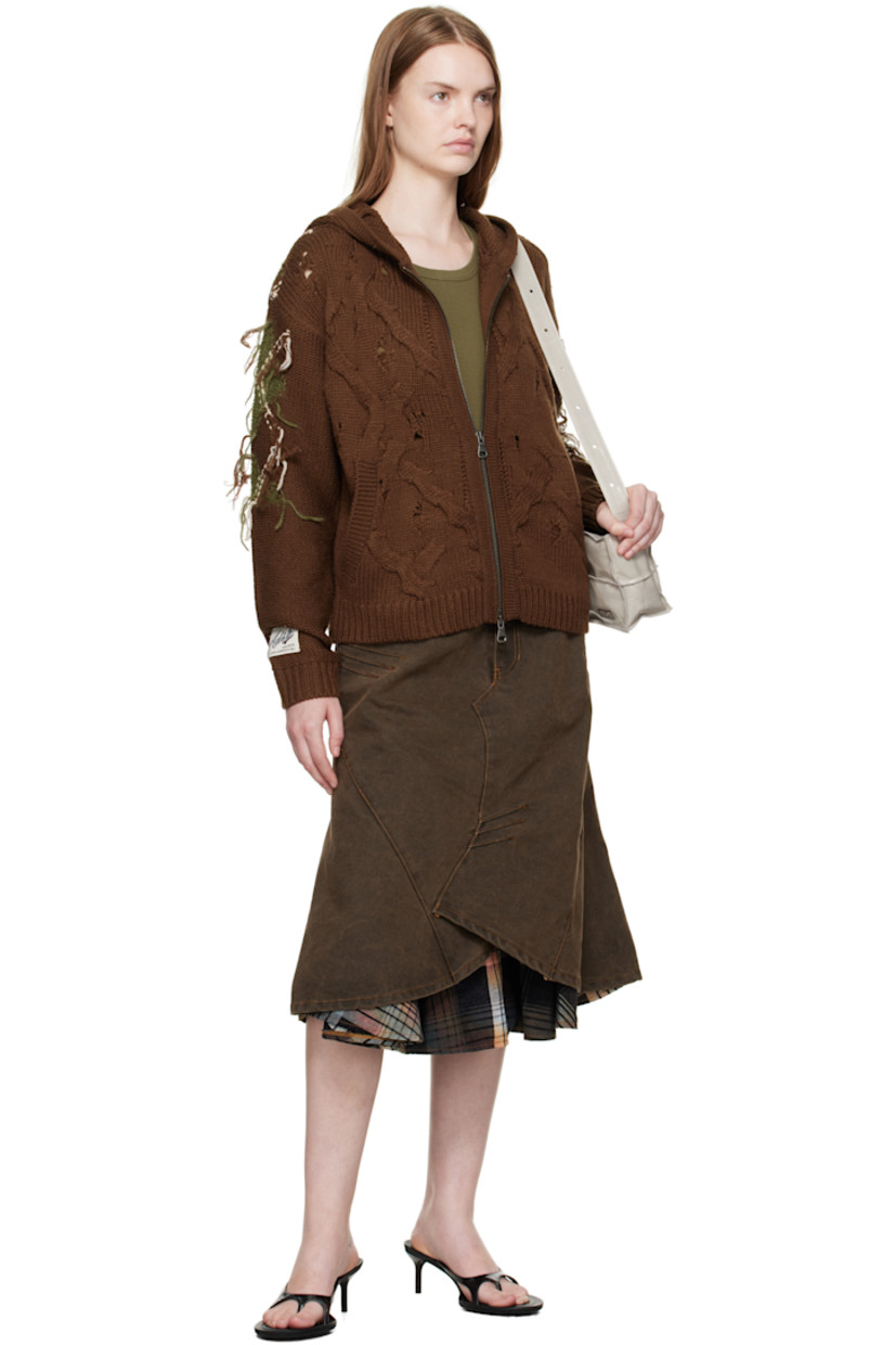 Non-stretch denim midi skirt.

· Fading throughout
· Paneled construction
· Darts throughout
· Belt loops at waist
· Five-pocket styling
· Zip fly
· Layered hem
· Leather logo patch at back waist

Supplier color: Sunset Brown