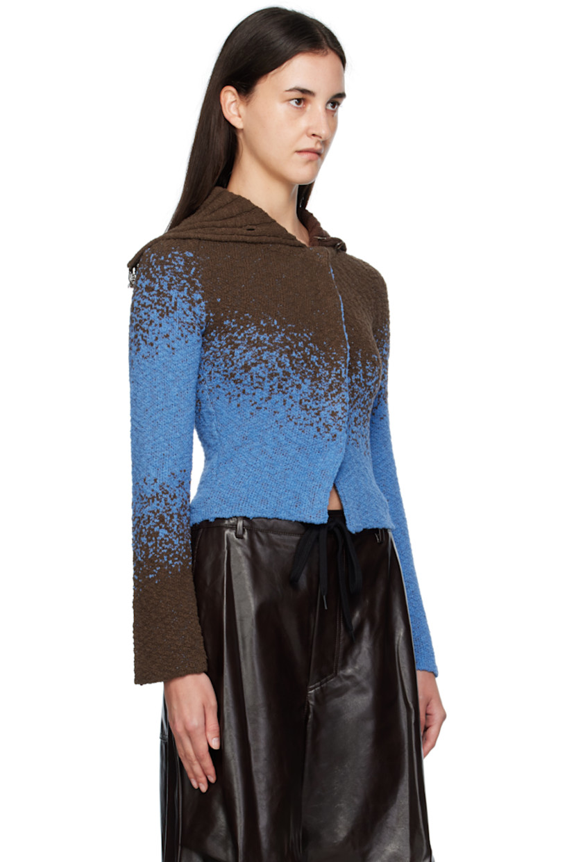 Knit cotton-blend cardigan.

· Rib-knit spread collar
· Offset press-stud closure
· Cropped hem
· Raglan sleeves

Supplier color: Blue/Brown