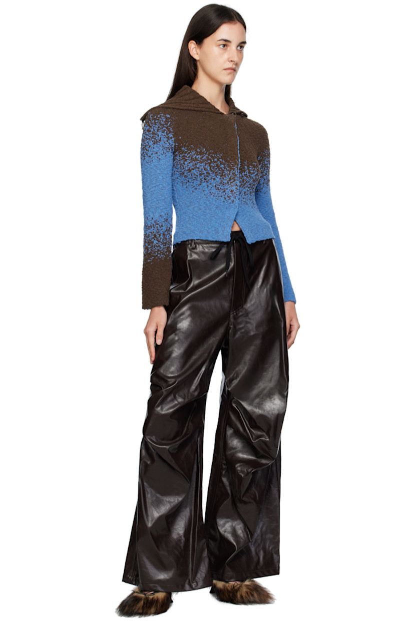 Knit cotton-blend cardigan.

· Rib-knit spread collar
· Offset press-stud closure
· Cropped hem
· Raglan sleeves

Supplier color: Blue/Brown