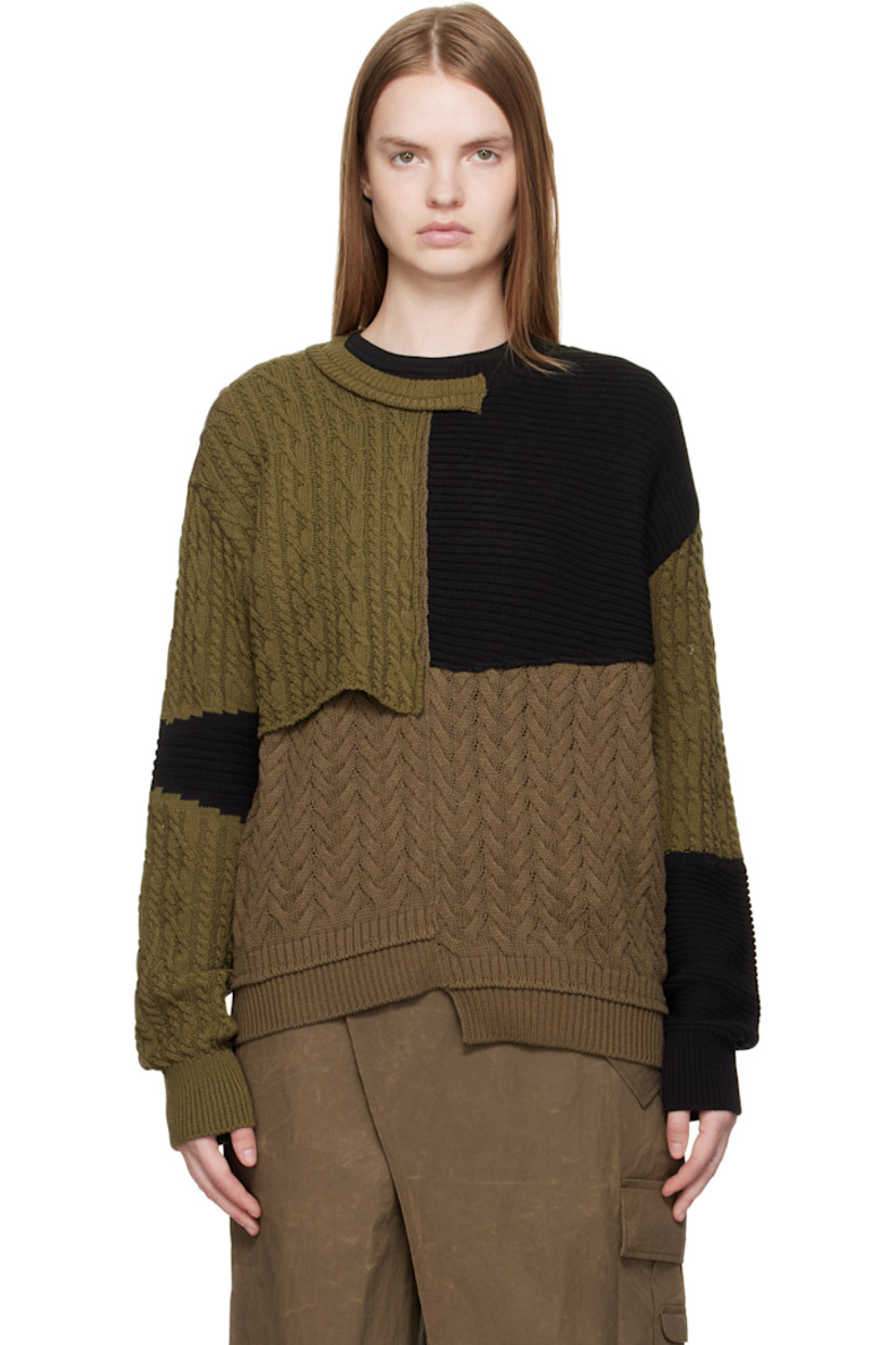 Cable-knit cotton- and wool-blend sweater.

· Assorted knit patchwork throughout
· Notched crewneck
· Overlay panel at front
· Asymmetrical hem

Supplier color: Multi