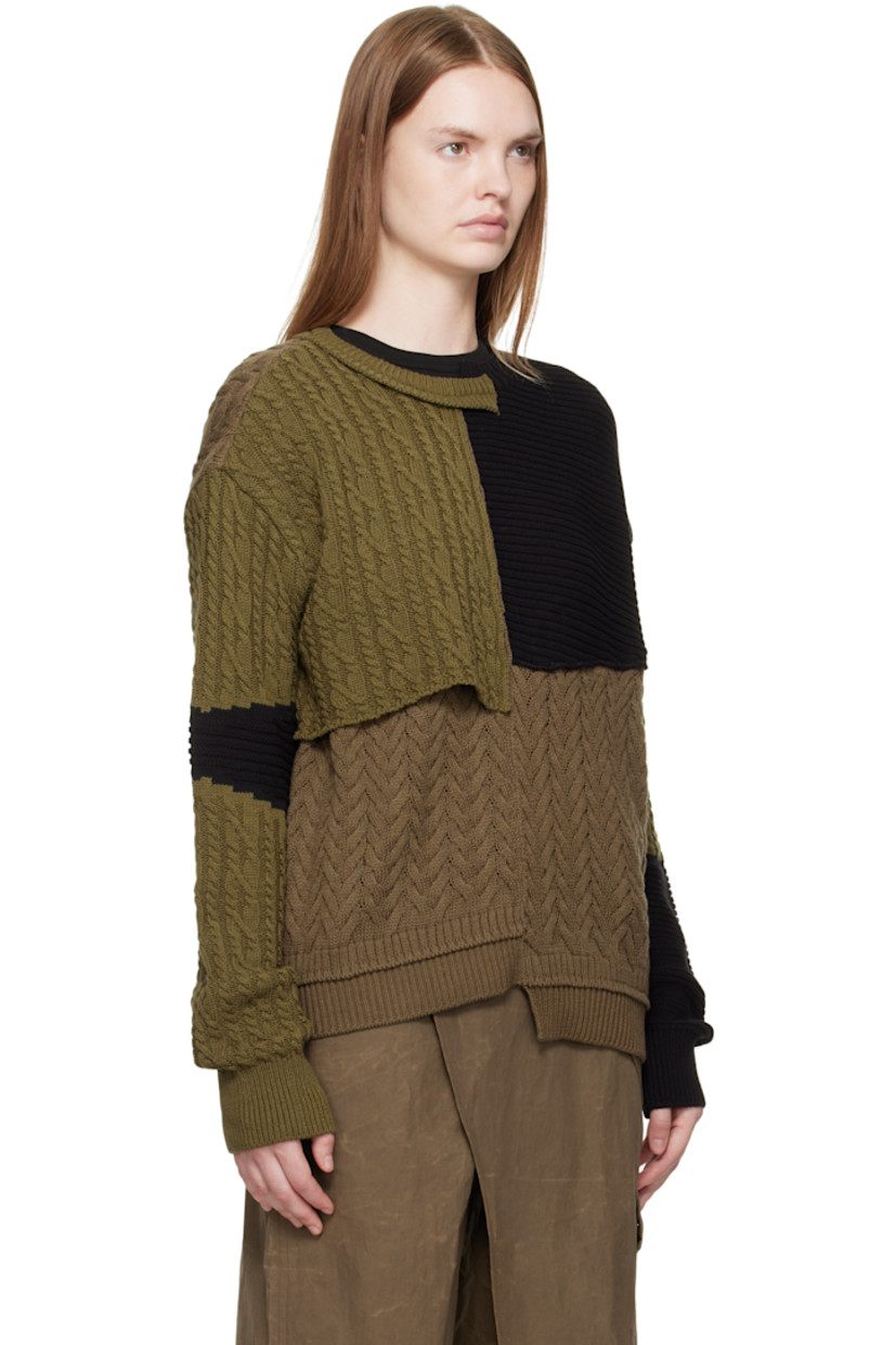 Cable-knit cotton- and wool-blend sweater.

· Assorted knit patchwork throughout
· Notched crewneck
· Overlay panel at front
· Asymmetrical hem

Supplier color: Multi