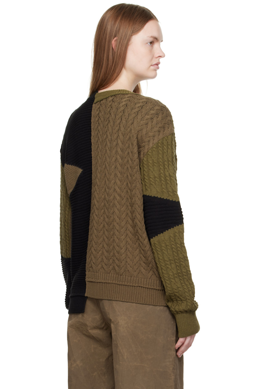 Cable-knit cotton- and wool-blend sweater.

· Assorted knit patchwork throughout
· Notched crewneck
· Overlay panel at front
· Asymmetrical hem

Supplier color: Multi