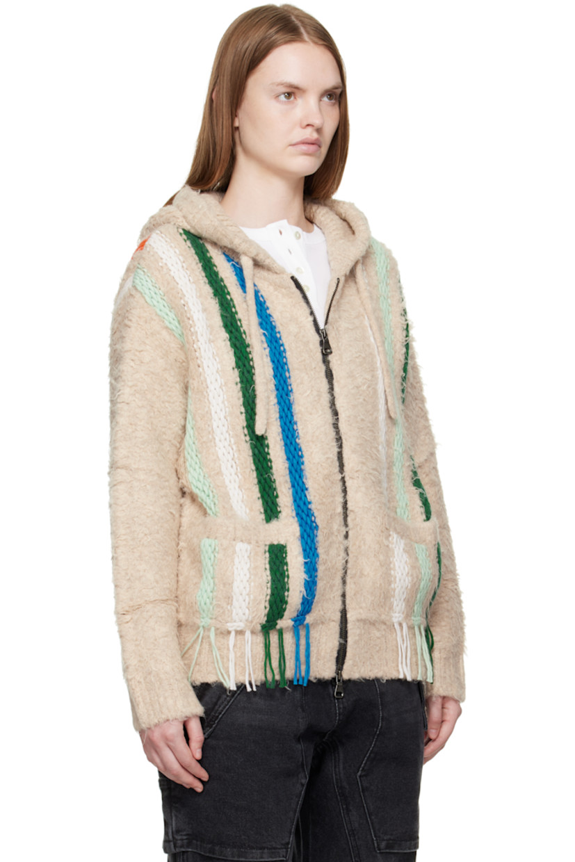 Shag-knit stretch cotton- and wool-blend hoodie.

· Intarsia stripes with fringed ends throughout
· Drawstring at hood
· Two-way zip closure
· Welt pockets at waist

Supplier color: Ecru