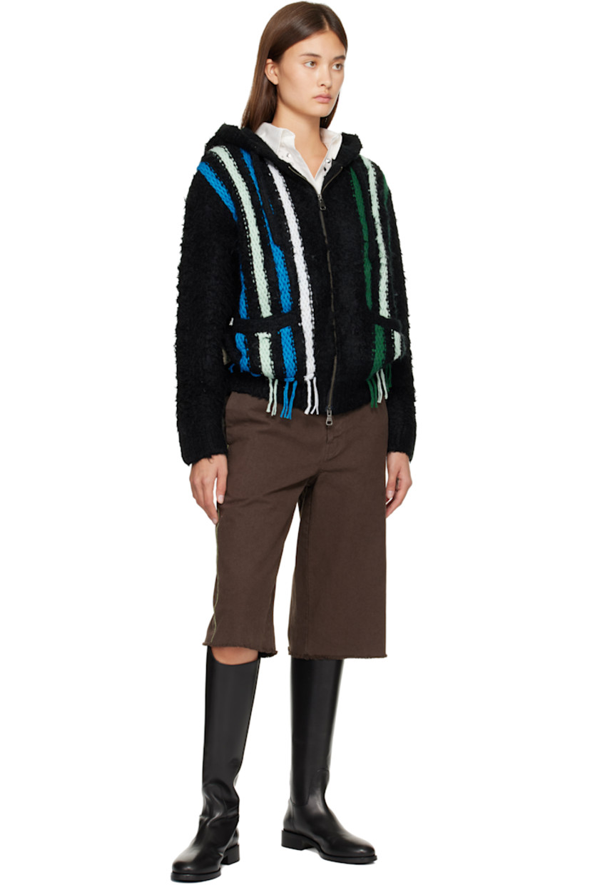 Brushed knit stretch hoodie.

· Stripes throughout
· Drawstring at hood
· Two-way zip closure
· Welt pockets at front
· Logo flag at side seam

Supplier color: Black