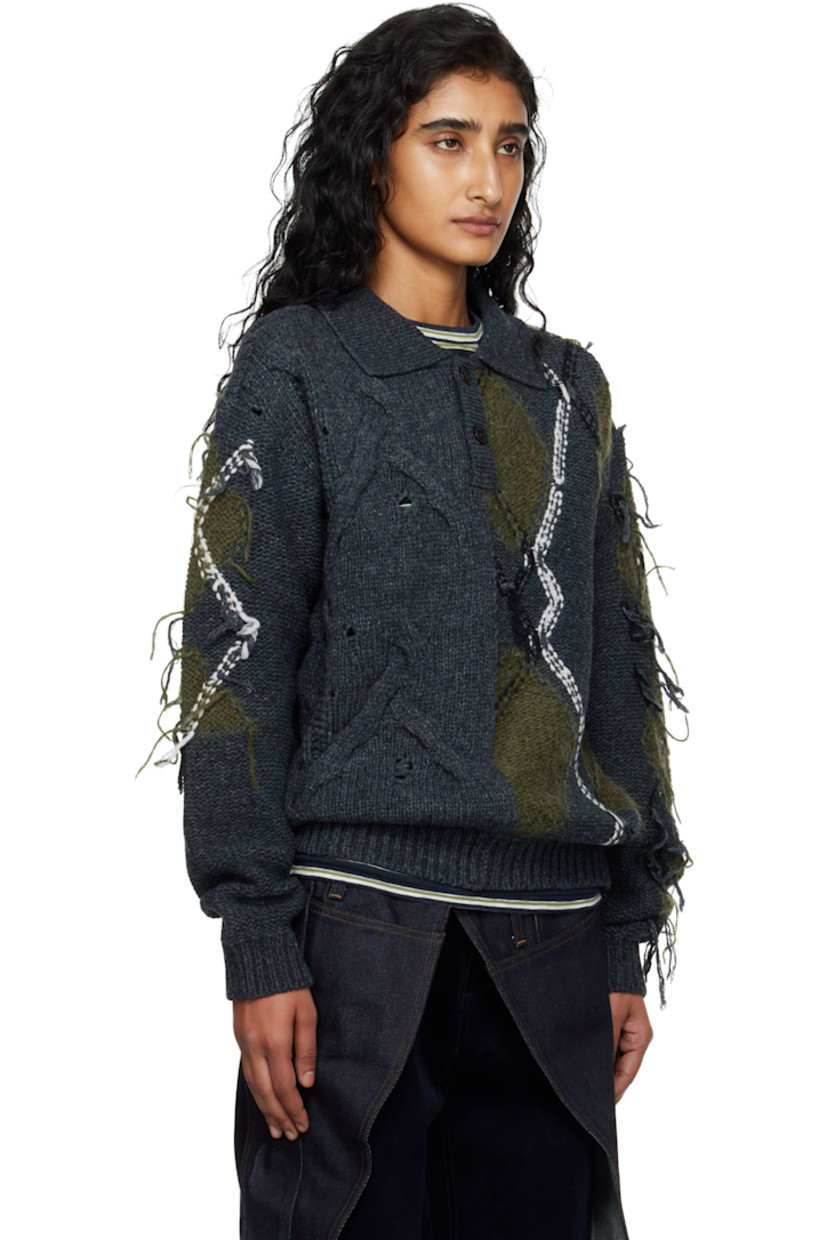 Cable-knit wool-blend polo.

· Fil-coupé and intarsia argyle pattern throughout
· Rib-knit spread collar, hem, and cuffs
· Two-button placket

Supplier color: Charcoal