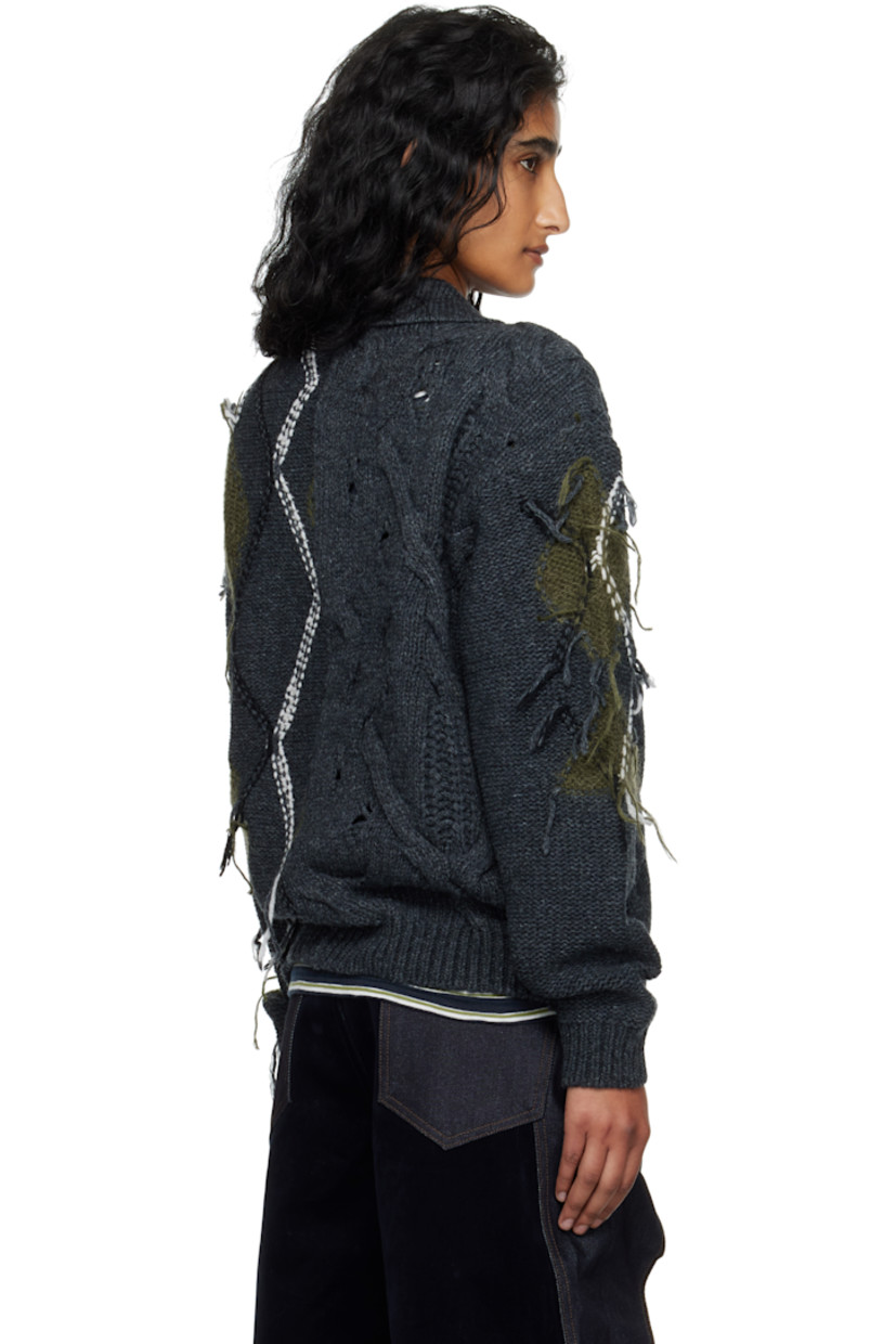 Cable-knit wool-blend polo.

· Fil-coupé and intarsia argyle pattern throughout
· Rib-knit spread collar, hem, and cuffs
· Two-button placket

Supplier color: Charcoal