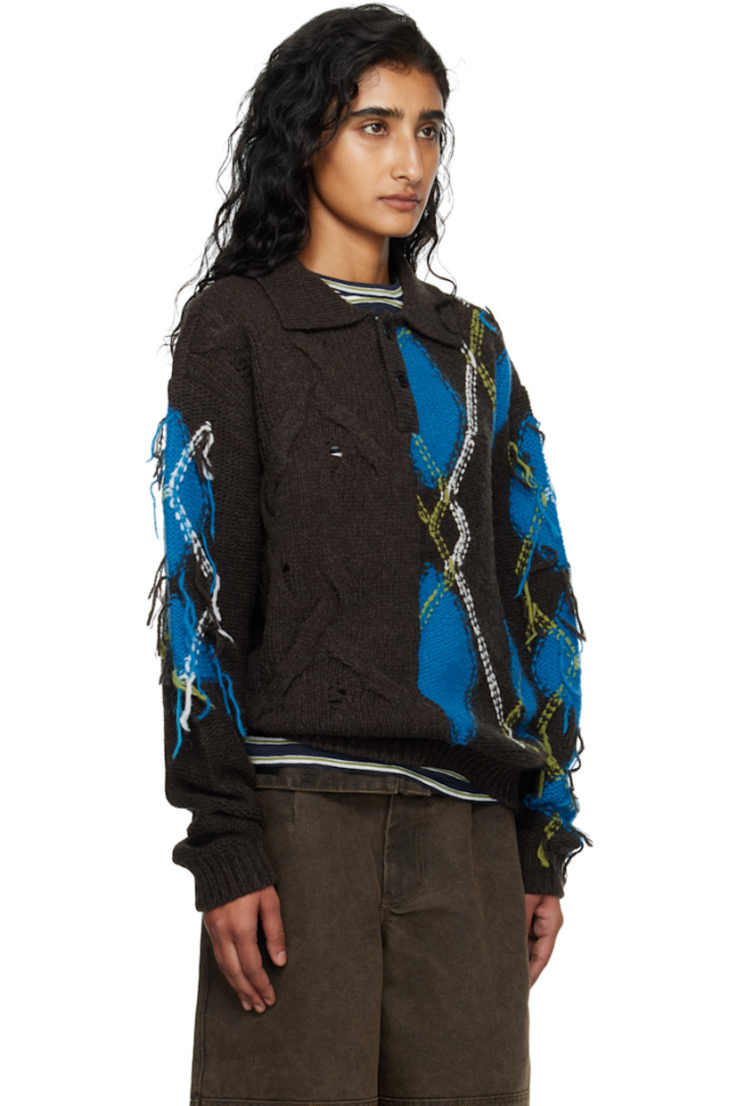 Cable-knit wool-blend polo.

· Fil-coupé and intarsia argyle pattern throughout
· Rib-knit spread collar, hem, and cuffs
· Two-button placket

Supplier color: Choco