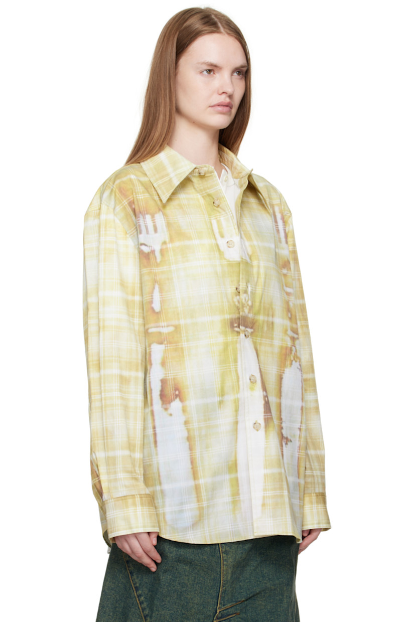 Stretch cotton-blend twill shirt.

· Printed discoloration and check pattern throughout
· Spread collar
· Button closure
· Shirttail hem
· Buttoned barrel cuffs
· Box pleat at back yoke

Supplier color: Yellow