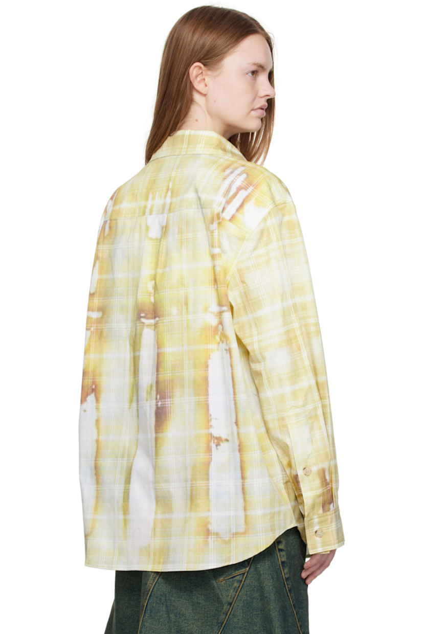 Stretch cotton-blend twill shirt.

· Printed discoloration and check pattern throughout
· Spread collar
· Button closure
· Shirttail hem
· Buttoned barrel cuffs
· Box pleat at back yoke

Supplier color: Yellow